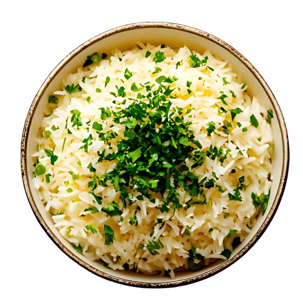 Overhead view of a bowl of white rice, generously topped with fresh green chopped parsley.